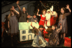 Allison Smith as Annie (C) w. Santa Claus and orphans in a scene from the Broadway production of the musical "Annie."