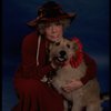 Betty Hutton as Miss Hannigan w. Sandy in a scene from the Broadway production of the musical "Annie."