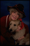 Betty Hutton as Miss Hannigan w. Sandy in a scene from the Broadway production of the musical "Annie."