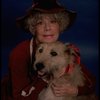 Betty Hutton as Miss Hannigan w. Sandy in a scene from the Broadway production of the musical "Annie."