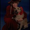 Betty Hutton as Miss Hannigan w. Sandy in a scene from the Broadway production of the musical "Annie."