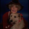 Betty Hutton as Miss Hannigan w. Sandy in a scene from the Broadway production of the musical "Annie."