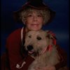 Betty Hutton as Miss Hannigan w. Sandy in a scene from the Broadway production of the musical "Annie."