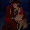 Betty Hutton as Miss Hannigan w. Sandy in a scene from the Broadway production of the musical "Annie."