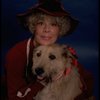 Betty Hutton as Miss Hannigan w. Sandy in a scene from the Broadway production of the musical "Annie."