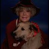 Betty Hutton as Miss Hannigan w. Sandy in a scene from the Broadway production of the musical "Annie."