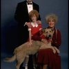 Betty Hutton as Miss Hannigan, Allison Smith as Annie, and John Schuck as Daddy Warbucks w. Sandy in a scene from the Broadway production of the musical "Annie."