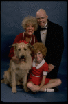 Betty Hutton as Miss Hannigan, Allison Smith as Annie, and John Schuck as Daddy Warbucks w. Sandy in a scene from the Broadway production of the musical "Annie."