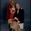 Betty Hutton as Miss Hannigan, Allison Smith as Annie, and John Schuck as Daddy Warbucks w. Sandy in a scene from the Broadway production of the musical "Annie."