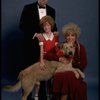 Betty Hutton as Miss Hannigan, Allison Smith as Annie, and John Schuck as Daddy Warbucks w. Sandy in a scene from the Broadway production of the musical "Annie."