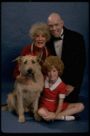 Betty Hutton as Miss Hannigan, Allison Smith as Annie, and John Schuck as Daddy Warbucks w. Sandy in a scene from the Broadway production of the musical "Annie."