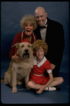 Betty Hutton as Miss Hannigan, Allison Smith as Annie, and John Schuck as Daddy Warbucks w. Sandy in a scene from the Broadway production of the musical "Annie."