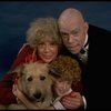 Betty Hutton as Miss Hannigan, Allison Smith as Annie, and John Schuck as Daddy Warbucks w. Sandy in a scene from the Broadway production of the musical "Annie."