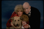 Betty Hutton as Miss Hannigan, Allison Smith as Annie, and John Schuck as Daddy Warbucks w. Sandy in a scene from the Broadway production of the musical "Annie."