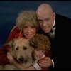 Betty Hutton as Miss Hannigan, Allison Smith as Annie, and John Schuck as Daddy Warbucks w. Sandy in a scene from the Broadway production of the musical "Annie."