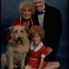 Betty Hutton as Miss Hannigan, Allison Smith as Annie, and John Schuck as Daddy Warbucks w. Sandy in a scene from the Broadway production of the musical "Annie."