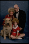 Betty Hutton as Miss Hannigan, Allison Smith as Annie, and John Schuck as Daddy Warbucks w. Sandy in a scene from the Broadway production of the musical "Annie."