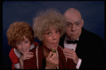 Betty Hutton as Miss Hannigan, Allison Smith as Annie, and John Schuck as Daddy Warbucks in a scene from the Broadway production of the musical "Annie."