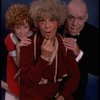 Betty Hutton as Miss Hannigan, Allison Smith as Annie, and John Schuck as Daddy Warbucks in a scene from the Broadway production of the musical "Annie."