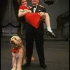 Norwood Smith as Daddy Warbucks and Theda Stemler as Annie w. Sandy in a scene from the Philadelphia production of the musical "Annie." (Philadelphia)