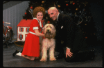 Norwood Smith as Daddy Warbucks and Theda Stemler as Annie w. Sandy in a scene from the Philadelphia production of the musical "Annie." (Philadelphia)