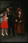 Theda Stemler as Annie, Ruth Kobart as Miss Hannigan and Norwood Smith as Daddy Warbucks in a scene from the Philadelphia production of the musical "Annie."