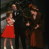 Theda Stemler as Annie, Ruth Kobart as Miss Hannigan and Norwood Smith as Daddy Warbucks in a scene from the Philadelphia production of the musical "Annie."