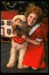 Theda Stemler as Annie w. Sandy in a scene from the Philadelphia production of the musical "Annie."