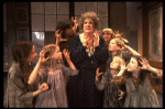 Ruth Kobart as Miss Hannigan w. orphans in a scene from the Philadelphia production of the musical "Annie." (Philadelphia)