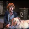 Kristi Coombs as Annie w. Sandy in a scene from the New Orleans production of the musical "Annie."