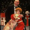 Kristi Coombs as Annie and Reid Shelton as Daddy Warbucks w. Sandy in a scene from the New Orleans production of the musical "Annie."