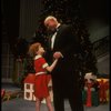 Kristi Coombs as Annie and Reid Shelton as Daddy Warbucks in a scene from the New Orleans production of the musical "Annie."