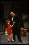 Kristi Coombs as Annie and Reid Shelton as Daddy Warbucks in a scene from the New Orleans production of the musical "Annie."