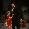 Kristi Coombs as Annie and Reid Shelton as Daddy Warbucks in a scene from the New Orleans production of the musical "Annie."