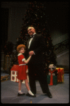Kristi Coombs as Annie and Reid Shelton as Daddy Warbucks in a scene from the New Orleans production of the musical "Annie."