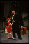 Kristi Coombs as Annie and Reid Shelton as Daddy Warbucks in a scene from the New Orleans production of the musical "Annie."