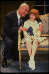 Kristi Coombs as Annie and Reid Shelton as Daddy Warbucks in a scene from the New Orleans production of the musical "Annie."