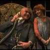 Kristi Coombs as Annie and Reid Shelton as Daddy Warbucks in a scene from the New Orleans production of the musical "Annie."