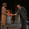 Kristi Coombs as Annie and Reid Shelton as Daddy Warbucks w. Grace in a scene from the New Orleans production of the musical "Annie."