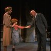 Kristi Coombs as Annie and Reid Shelton as Daddy Warbucks w. Grace in a scene from the New Orleans production of the musical "Annie."