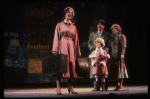 Kristi Coombs as Annie and Reid Shelton as Daddy Warbucks w. Grace in a scene from the New Orleans production of the musical "Annie."