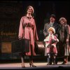 Kristi Coombs as Annie and Reid Shelton as Daddy Warbucks w. Grace in a scene from the New Orleans production of the musical "Annie."