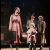 Kristi Coombs as Annie and Reid Shelton as Daddy Warbucks w. Grace in a scene from the New Orleans production of the musical "Annie."