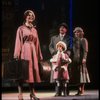 Kristi Coombs as Annie and Reid Shelton as Daddy Warbucks w. Grace in a scene from the New Orleans production of the musical "Annie."
