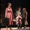 Kristi Coombs as Annie and Reid Shelton as Daddy Warbucks w. Grace in a scene from the New Orleans production of the musical "Annie."
