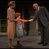 Kristi Coombs as Annie and Reid Shelton as Daddy Warbucks w. Grace in a scene from the New Orleans production of the musical "Annie."