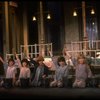 Kristi Coombs as Annie (C) w. orphans in a scene from the New Orleans production of the musical "Annie."