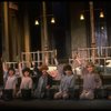 Kristi Coombs as Annie (C) w. orphans in a scene from the New Orleans production of the musical "Annie."
