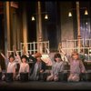 Kristi Coombs as Annie (C) w. orphans in a scene from the New Orleans production of the musical "Annie."