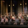 Kristi Coombs as Annie (C) w. orphans in a scene from the New Orleans production of the musical "Annie."